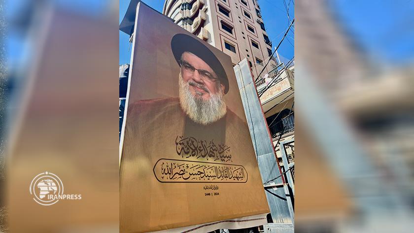 Iranpress: وقفة احتجاجية للمسلمين الشيعة في نيودلهي دعما لحزب الله