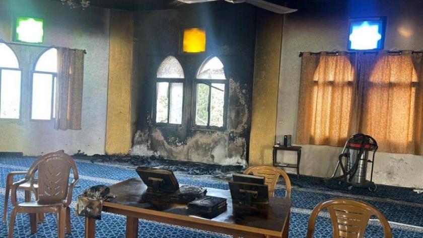 Iranpress: وزارة الأوقاف الفلسطينية تستنكر إحراق مسجد على يد مستوطنين في سلفيت
