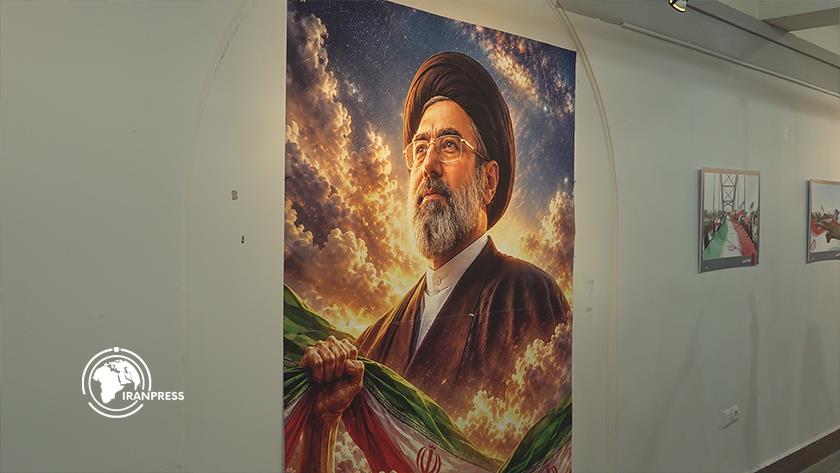 Iranpress: “40 Days of Glory” Photo Exhibition Opens, Documenting Sacred Defense